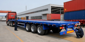 Chinese semi-trailer factory loading a flatbed semi-trailer for shipment to Nigeria
