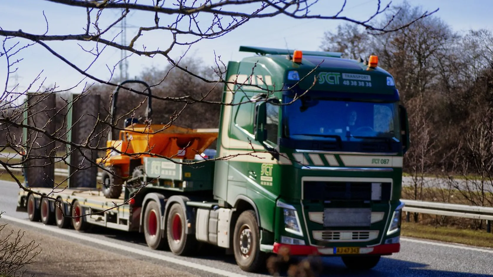 Lowbed trailer moving heavy equipment for Botswana mining logistics
