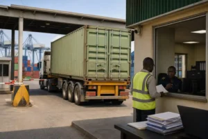 Flatbed semi-trailer prepared for shipment to Lagos port